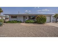 Charming single-story home with desert landscaping and a well-maintained front yard at 5317 E Baltimore St, Mesa, AZ 85205