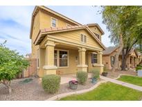 Charming two-story home with a well-maintained front yard and desert landscaping at 2873 S Arroyo Ln, Gilbert, AZ 85295