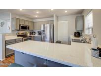 Modern kitchen with stainless steel appliances and granite countertops at 22741 N Scott Dr, Maricopa, AZ 85138