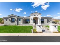 Stunning single-story home featuring lush green lawn, elegant stone walkway and a three-car garage at 3046 W Redwood Ln, Phoenix, AZ 85045