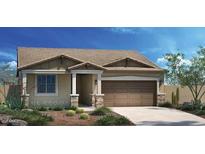 Charming single-story home featuring a two-car garage, well-maintained lawn and neutral color palette at 19022 W Rose Ln, Waddell, AZ 85355