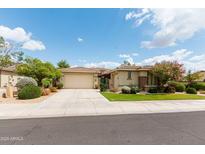 Charming single-Gathering home with manicured landscaping and a spacious two-car garage at 4313 N 161St Ave, Goodyear, AZ 85395