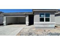 Charming single-story home featuring a convenient attached two-car garage and a modern design at 5016 S 106Th Ln, Tolleson, AZ 85353