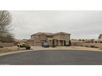 Stunning two-story home featuring desert landscaping, a multi-car garage and private drive in a desirable neighborhood at 5508 N 83Rd Dr, Glendale, AZ 85305
