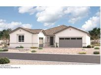 Charming single-story home featuring a spacious two-car garage and desert landscaping for low maintenance at 4740 W Capistrano Ave, Laveen, AZ 85339