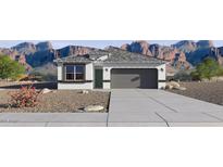 Charming single-story home showcasing desert landscaping and a two-car garage at 1366 W Hess Ave, Coolidge, AZ 85128