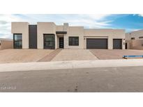 Contemporary home with modern architectural details and a neutral color palette at 33857 N Borgata Trl, San Tan Valley, AZ 85144