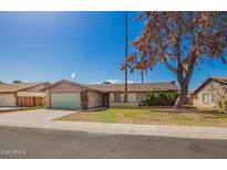 Charming single-story home features a well-maintained front yard and attached two-car garage at 5421 W Seldon Ln, Glendale, AZ 85302