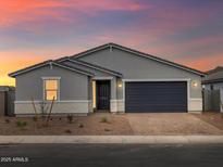 Charming single-story home featuring neutral paint, a two-car garage, and attractive desert landscaping at 4777 W Hunter Trl, San Tan Valley, AZ 85144