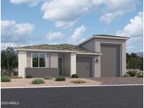 Charming single-story home featuring a three-car garage and low maintenance desert landscaping at 7674 W Rowel Rd, Peoria, AZ 85383