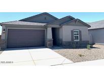 Charming single-story home featuring a two-car garage and neutral paint scheme at 36939 W Santa Maria St, Maricopa, AZ 85138