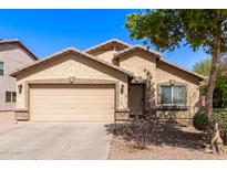 Charming single-Gathering home featuring a two-car garage and low-maintenance landscaping at 4076 E Silverbell Rd, San Tan Valley, AZ 85143