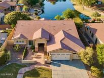 Scenic lake view from the backyard, featuring lush greenery and a tranquil atmosphere at 3750 E Sawtooth Dr, Chandler, AZ 85249