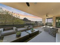 Spacious covered patio boasts comfortable seating and mountain views perfect for outdoor relaxation at 5527 E Arroyo Verde Dr, Paradise Valley, AZ 85253
