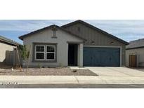 Charming single-story home featuring a two-car garage and low-maintenance desert landscaping at 36955 W Santa Maria St, Maricopa, AZ 85138