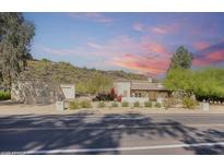 Charming single-story home with mature desert landscaping and mountain views at 14814 N Coral Gables Dr, Phoenix, AZ 85023