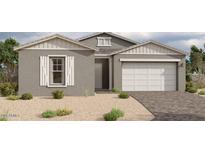 Charming single-story home with a two-car garage, shuttered window, and low maintenance desert landscaping at 11422 E Utah Ave, Mesa, AZ 85212
