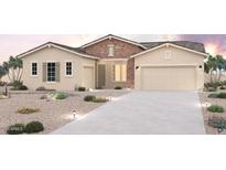 Charming single-Gathering home featuring a stone facade, two-car garage, and desert landscaping at 19019 W Ocotillo Rd, Waddell, AZ 85355