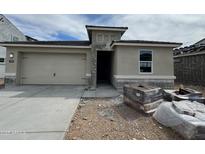 New single-story home features a two-car garage, neutral stucco, and a covered porch area at 7425 W Buckhorn Trl, Peoria, AZ 85383