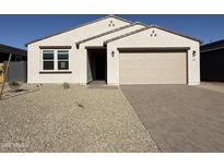 Charming single-story home with a two-car garage and low maintenance desert landscaping at 4439 S 95Th Dr, Tolleson, AZ 85353