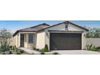 Single-story home featuring a neutral color scheme, a two-car garage, and low-maintenance desert landscaping at 14586 W Wood Dr, Surprise, AZ 85379