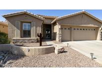Charming single-story home showcasing a well-manicured landscape, desert accents, and a two-car garage at 24816 S Golfview Dr # 46, Sun Lakes, AZ 85248