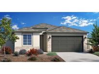 Charming single-story home with a neutral color palette, well-manicured landscaping, and a two-car garage at 4949 W Walatowa St, Laveen, AZ 85339