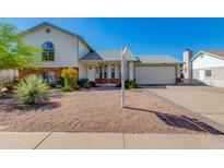 Charming two-story home with a well-maintained front yard at 6031 E Inglewood St, Mesa, AZ 85205