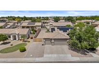 Nice aerial view shows the property, large driveways and well maintained neighborhood at 1182 E Canyon Way, Chandler, AZ 85249