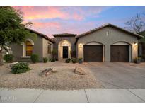 Charming single-Gathering home features an inviting stone accented entryway and a spacious two-car garage at 3841 E Patrick Ln, Phoenix, AZ 85050