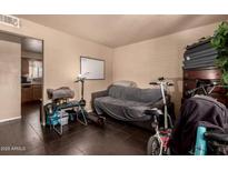 Cozy living area featuring a whiteboard, comfortable seating, and ample space for a small kitchenette at 801 E Oakland St, Chandler, AZ 85225