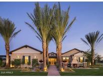 Charming single-story home with desert landscaping, stone accents, and covered front porch at 17673 E Bronco Dr, Queen Creek, AZ 85142