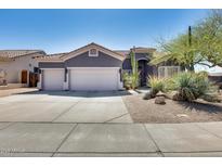 Charming single-story home with a three-car garage and drought-tolerant landscaping at 29023 N 48Th Ct, Cave Creek, AZ 85331