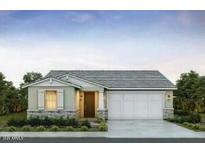 Charming single-story home featuring stone accents, a gray roof, and a two-car garage, creating an inviting curb appeal at 17387 W Carlisle Dr, Surprise, AZ 85388