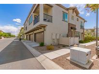 A charming two-story home with a private balcony and well maintained desert landscaping at 1851 E Frye Rd # 101, Gilbert, AZ 85295
