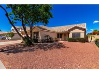 Charming single-story home featuring a low-maintenance desert landscape and a private front entry at 3140 N 114Th Dr, Avondale, AZ 85392