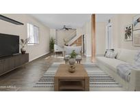 Inviting living room with an open floor plan, stylish furnishings, and a bright, airy atmosphere at 6007 N 79Th St, Scottsdale, AZ 85250