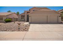 Charming home with a three car garage and desert landscaping at 1431 W Mountain Sky Ave, Phoenix, AZ 85045