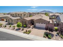 Charming single-story home featuring a tile roof, well-manicured landscaping, and a two-car garage at 3269 E Ironside Ln, Gilbert, AZ 85298
