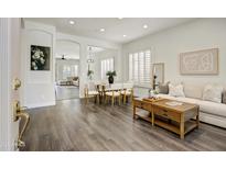 Open-concept living room featuring modern furnishings and hardwood floors at 10351 E Morning Star Dr, Scottsdale, AZ 85255