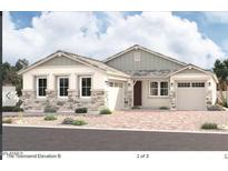 Charming single-story home with stone accents, a two-car garage, and a well-manicured front yard at 11660 W Luxton Ln, Avondale, AZ 85323