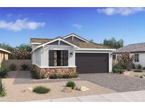 Charming single-story home with stone accents, a well-manicured lawn, and a two-car garage at 20309 W Roma Ave, Buckeye, AZ 85396