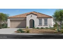 Charming single-story home showcasing a tile roof, arched entryway, and low-maintenance desert landscaping at 24649 W Jessica Ln, Buckeye, AZ 85326