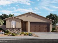 Charming single-story home featuring a two-car garage and beautiful desert landscaping at 3471 E Audrey Dr, San Tan Valley, AZ 85143