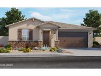 Charming single-story home featuring a stone-accented facade and well-manicured landscaping at 16080 W Prickly Pear Trl, Surprise, AZ 85387