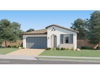 Charming single-story home with a two-car garage, stucco siding, and a tile roof surrounded by lush landscaping at 4975 S 233Rd Dr, Buckeye, AZ 85326