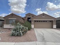 Charming single-story home with desert landscaping, neutral colors, and a spacious two-car garage at 29193 N Mountain View Rd, San Tan Valley, AZ 85143