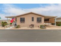 Inviting single-story home with covered parking and tidy desert landscaping at 11596 W Sierra Dawn Blvd # 307, Surprise, AZ 85378