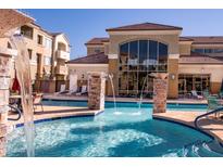 Resort-style pool area with fountains and comfortable seating offers a relaxing outdoor experience at 18416 N Cave Creek Rd # 3050, Phoenix, AZ 85032