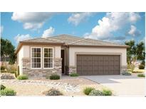 Charming single-story home featuring stone accents, a two-car garage, and desert landscaping for curb appeal at 18498 E Dario Rd, Gold Canyon, AZ 85118
